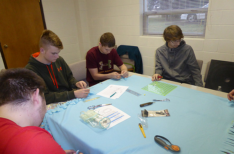 Youth Making Blanket